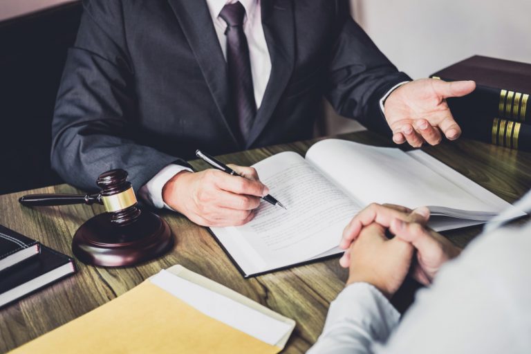 person speaking to a lawyer