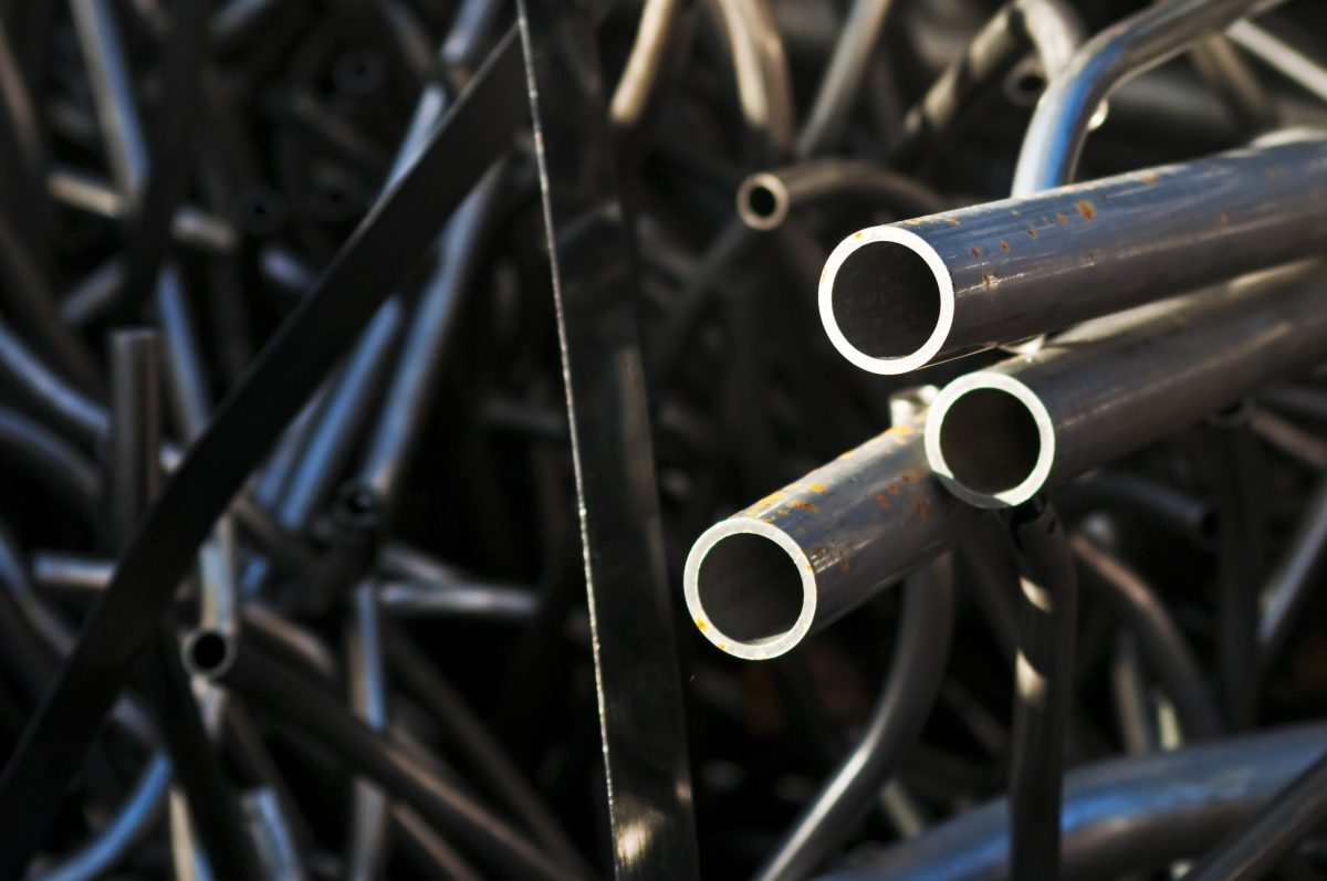 Various metal tubes on a pile